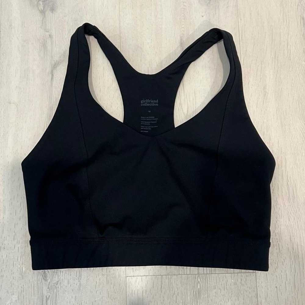 Girlfriend Collective black racer back  sports bra with triangle cut out  medium